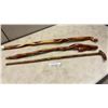 Image 1 : Three Handcrafted Wood Walking Staffs with Carved Twist and Knob Handles, Approximately 36" High