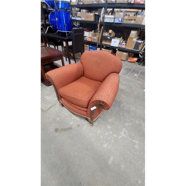 Vintage Rust-Orange Upholstered Armchair with Rolled Arms and Carved Wooden Accents