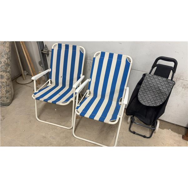 Pair of Blue and White Striped Folding Beach Chairs with White Frames and Grocery Cart
