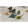 Image 4 : Assorted Plastic Dinosaur Figures, Toy Jeep, and Interlocking Track Pieces