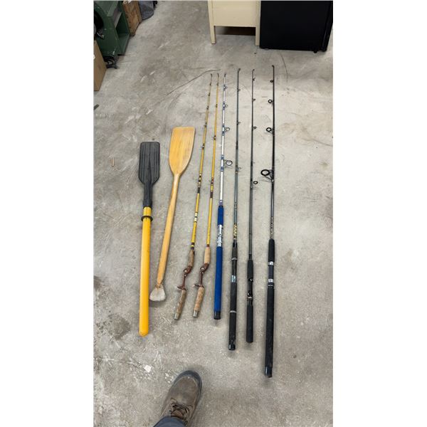 6 Fishing Rods, Wooden Paddle, and Yellow Plastic Oar