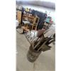 Image 6 : Barrel of Assorted Garden Tools Including Shovels, Hoes, Rakes, Pickaxe, Plow Shares and More