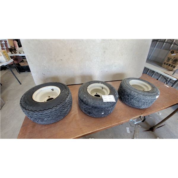 Three Carlisle and Kenda 18 x 8.50 x 8 Turf Tires on White 4-Lug Steel Rims