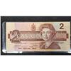 Image 6 : 2 x 1973 Canada $1 Bills, 2 x 1986 Canada $2 Bills, and 2 x 1954 Canada $1 Bills