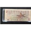 Image 9 : 2 x 1973 Canada $1 Bills, 2 x 1986 Canada $2 Bills, and 2 x 1954 Canada $1 Bills