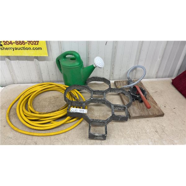 Yellow Air Hose, Green Watering Can, Hexagonal Concrete Paver Mold and Manual Diaphragm Pump