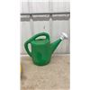 Image 4 : Yellow Air Hose, Green Watering Can, Hexagonal Concrete Paver Mold and Manual Diaphragm Pump