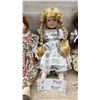 Image 4 : Set of Four Collectible Porcelain Dolls with Lace-Trimmed Dresses and Braided Hair