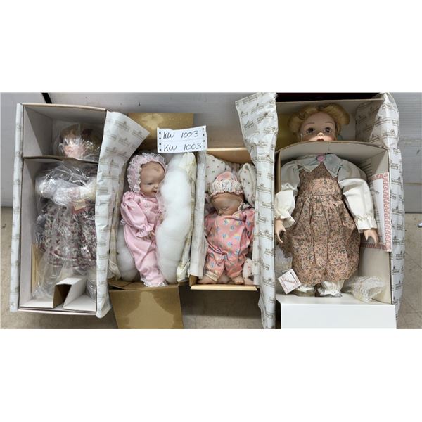 4 Ashton-Drake Porcelain Dolls