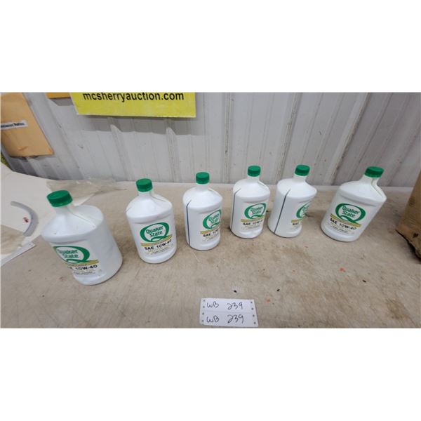 Six Bottles of Quaker State DeLuxe SAE 10W-40 Motor Oil, 32 Fluid Ounces Each