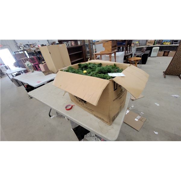 Artificial Christmas Tree in Cardboard Box I Think