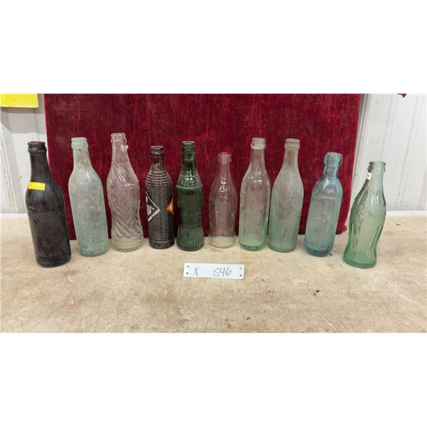 Vintage Glass Soda Bottle Collection Including Coca-Cola, Orange Crush, and Royal Crown Cola