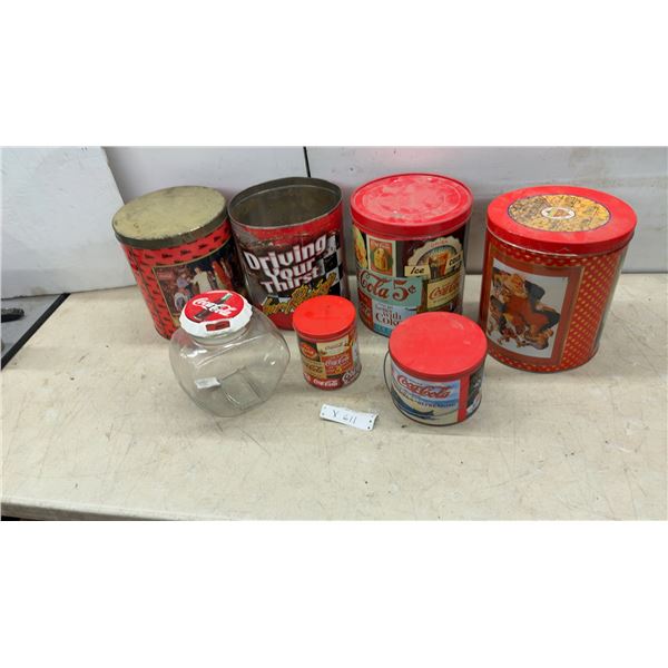 Collection of Vintage Coca-Cola Collectible Tins with Santa, Racing, and 3 Ad Designs Posters