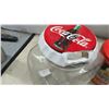 Image 7 : Collection of Vintage Coca-Cola Collectible Tins with Santa, Racing, and 3 Ad Designs Posters