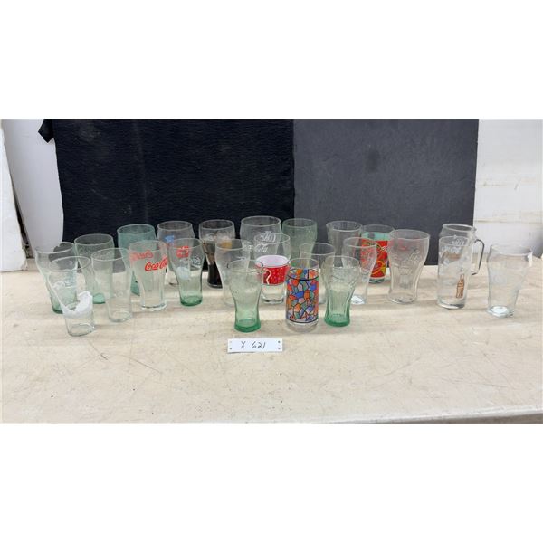 Assorted Coca-Cola Collectible Drinking Glasses Including Green Contour and Holiday Designs