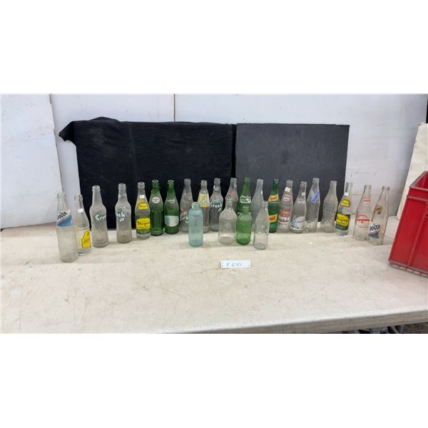Vintage Glass Soda Bottles Including Fanta, Vernors, Crush, Hires, Schweppes, Squirt and More
