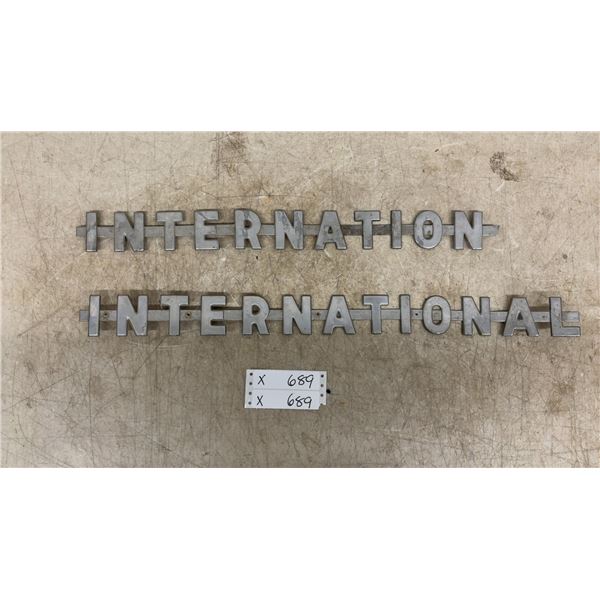 Pair of Vintage International Truck Hood Emblems