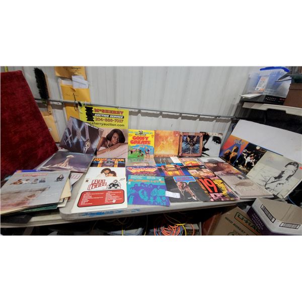 Lot of Vinyl Records Including Rock and Hyde, The Police, John Denver, Jethro Tull and More 45x