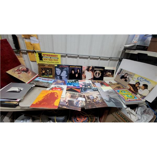 Assortment of Vinyl Records Including REO Speedwagon, Steppenwolf, BTO, Kenny Rogers and More Apox.