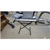 Image 1 : Yamaha PortaSound PSS-450 Electronic Keyboard with X-Style Stand, Cables, and More
