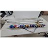 Image 1 : Shimano Ultra Cast Baitcasting Rod and Reel, Patterned Beach Mat, and Window Blind Headrail