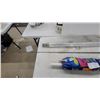 Image 5 : Shimano Ultra Cast Baitcasting Rod and Reel, Patterned Beach Mat, and Window Blind Headrail