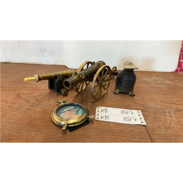 Two Brass Miniature Cannons, Brass & Glass Pocket Watch-Style Picture Frame, & Cast Iron Penguin