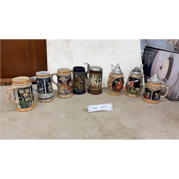 Collection of Nine German Bavarian Ceramic Beer Steins with Folk Scenes and Pewter Lids