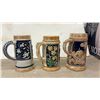 Image 5 : Collection of Nine German Bavarian Ceramic Beer Steins with Folk Scenes and Pewter Lids
