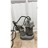 Image 6 : Sump Pump, Chrome Two-Handle Faucet, Ridgid Pipe Wrench, and Ideal Fish Tape Reel