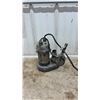 Image 7 : Sump Pump, Chrome Two-Handle Faucet, Ridgid Pipe Wrench, and Ideal Fish Tape Reel