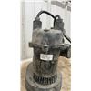 Image 8 : Sump Pump, Chrome Two-Handle Faucet, Ridgid Pipe Wrench, and Ideal Fish Tape Reel