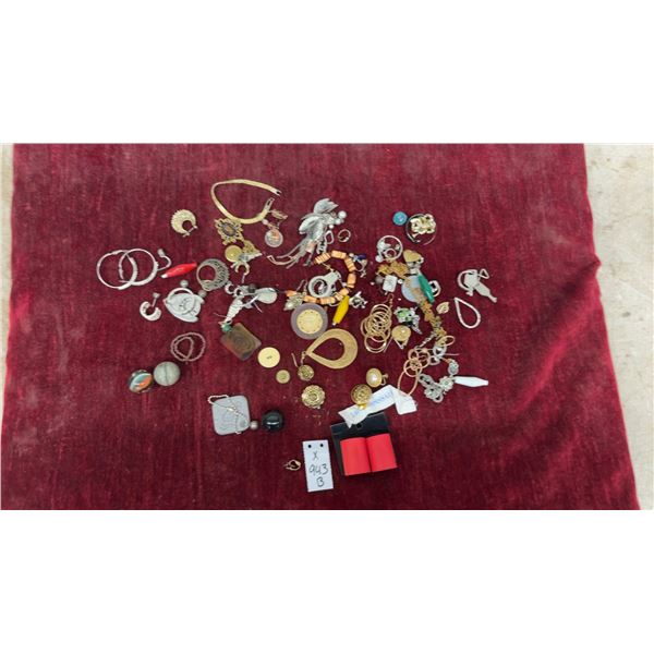 Assortment of Costume Jewelry Including Earrings, Brooches, Necklaces, Marbles, and More