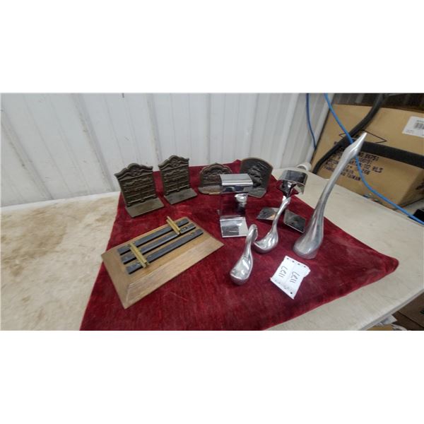 Ornate Metal Bookends, Wooden Display Stand, Polished Metal Door Handles, and More