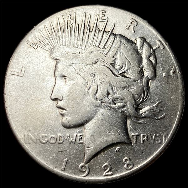 1928 Silver Peace Dollar ABOUT UNCIRCULATED