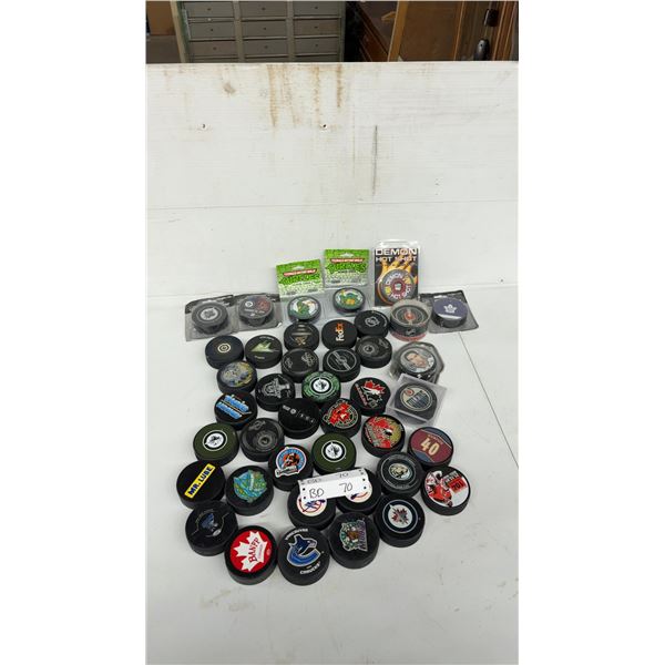 Vintage Hockey Puck Lot: Winnipeg Jets, Ninja Turtles, New Jersey Devils, Team Canada and More