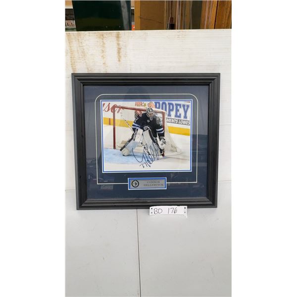Winnipeg Jets Connor Hellebuyck Framed Autographed Photo with COA - 16.5" C 15.5"