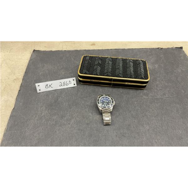 Replica Rolex Oyster Perpetual Date Deepsea Sea-Dweller Diving Watch and Beaded Clutch