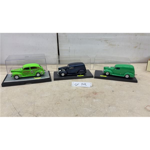 Three 1:18 Scale Die-Cast Ford Sedan Delivery Models, 1940 and 1937, with Display Cases