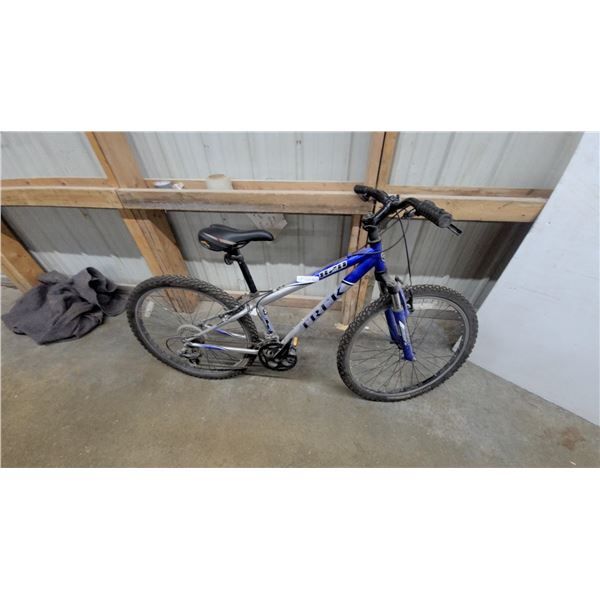 Trek 820 Mountain Bike, Blue and Silver Frame with Front Suspension and Knobby Tires 26"