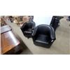 Image 1 : Pair of Black Leather Barrel-Style Armchairs with Removable Seat Cushions