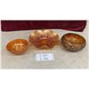 Image 1 : 3 Pieces of Marigold Carnival Glass: Dugan Poppy Show, Northwood Grape and Cable, Fenton Rose Show