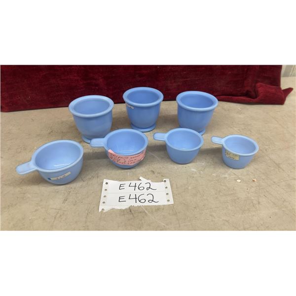 Six Pieces of Vintage Delphite Blue Milk Glass: Four Tab-Handle Measuring Cups, Three Cups