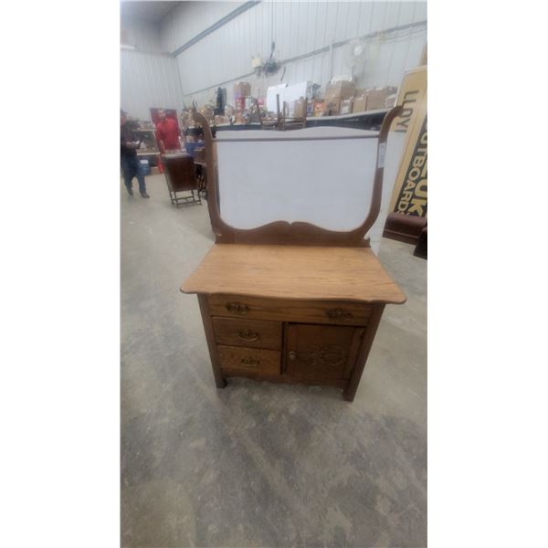 Antique Oak Washstand with Towel Rack Two Drawers, and Carved Lower Cabinet 49 x 32 x 18"