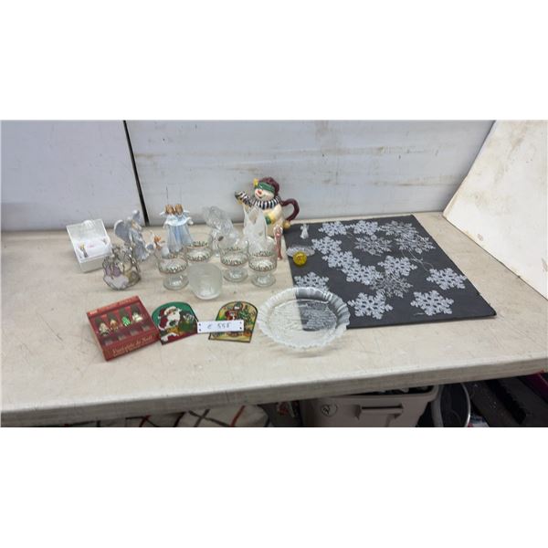 Assorted Christmas Décor Including Snowman Teapot, Angel Figurines, Snowflake Ornaments and More.