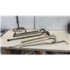 Image 1 : Assortment of Walking Canes and Sticks Including Wood, Aluminum, and Adjustable Styles