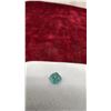 Image 16 : Round Pinkish-Orange Pyrope Garnet Gemstone, Octagon Green Tourmaline Gemstone and Very Light Blue