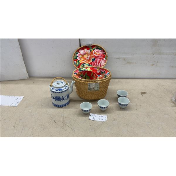 Chinese Jingdezhen Blue and White Porcelain Tea Set with Teapot, Four Cups, and Woven Basket.