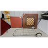 Image 1 : Vintage Wooden Chessboard, Red Metal-Framed Game Board table , and Foldable Wire Shopping Cart