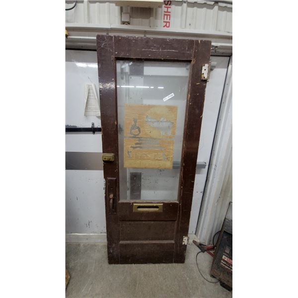 Vintage Wooden Door with Glass Panel, Brass Mail Slot, and Surface-Mounted Lock